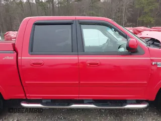 2003 Ford F-150 XLT with VIN 1FTRW07LX3KA76162, listed as a IAAI auction lot 41783926 with 119,009 mi miles. Bid and sale history available at carsss.com. Image 13.