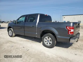 2020 Ford F-150 XL with VIN 1FTEW1C4XLFA23862, listed as a Copart auction lot 45156215 with 104,872 mi miles and Salvage Title. Bid and sale history available at carsss.com. Image 2.