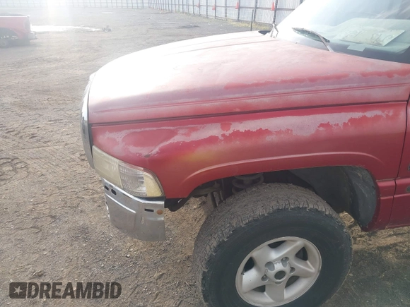 1999 Dodge 1500 z VIN 1B7HF16Y2XS185896, wystawiony jako IAAI lot #42251046 z przebiegiem 258 932 mil mil oraz . Historia ofert i sprzedaży dostępna na DreamBid. Obrazek 12.