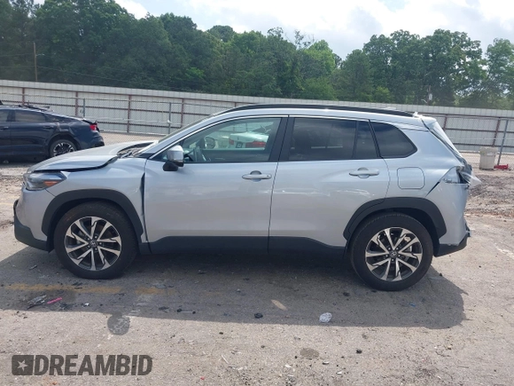 2023 Toyota Corolla Cross XLE with VIN 7MUDAAAG0PV057750, listed as a IAAI auction lot 42302284 with 31,404 mi miles and . Bid and sale history available at DreamBid. Image 14.