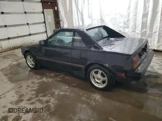 1986 Toyota MR2 z VIN JT2AW15C6G0076546, wystawiony jako Copart lot #73481234 z przebiegiem 148 909 mil mil oraz Szkody całkowita. Historia ofert i sprzedaży dostępna na DreamBid. Obrazek 2.