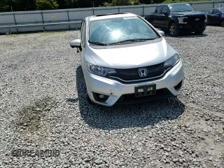 2015 Honda Fit EX-L with VIN 3HGGK5H84FM708209, listed as a Copart auction lot 59337085 with 130,355 mi miles and Salvage title. Bid and sale history available at DreamBid. Image 14.