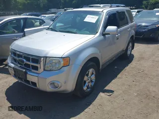 2010 Ford Escape Limited z VIN 1FMCU9EG7AKC87480, wystawiony jako IAAI lot #42748832 z przebiegiem 86 566 mil mil oraz . Historia ofert i sprzedaży dostępna na DreamBid. Obrazek 2.