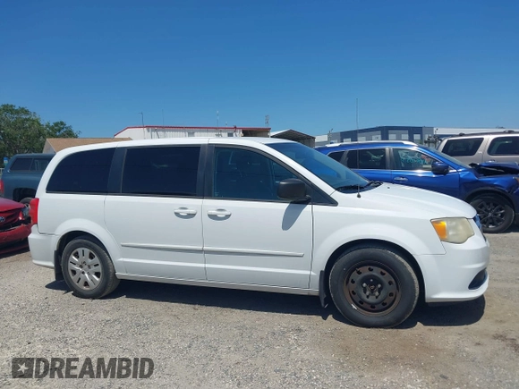 2014 Dodge Grand Caravan American Value with VIN 2C4RDGBG5ER187005, listed as a IAAI auction lot 42018333 with 216,149 mi miles and . Bid and sale history available at DreamBid. Image 13.