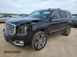2018 GMC Yukon Denali with VIN 1GKS1CKJ8JR201028, listed as a Copart auction lot 83478394 with 133,302 mi miles and Salvage Title. Bid and sale history available at carsss.com. Image 1.