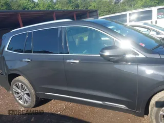 2020 Cadillac XT6 FWD Premium Luxury with VIN 1GYKPCRS0LZ206567, listed as a IAAI auction lot 42254511 with 80,443 mi miles and . Bid and sale history available at DreamBid. Image 14.