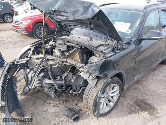 2015 BMW X1 xDrive28i with VIN WBAVL1C57FVY28954, listed as a IAAI auction lot 41857286 with 1 mi miles. Bid and sale history available at carsss.com. Image 14.