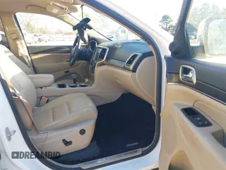2014 Jeep Grand Cherokee Limited with VIN 1C4RJEBG9EC414265, listed as a IAAI auction lot 41843360 with 118,767 mi miles and . Bid and sale history available at DreamBid. Image 5.