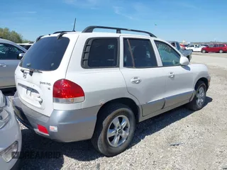 2005 Hyundai Santa Fe GLS with VIN KM8SC13D95U888747, listed as a IAAI auction lot 38833174 with 154,111 mi miles. Bid and sale history available at carsss.com. Image 4.