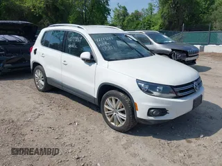 2012 Volkswagen Tiguan SEL with VIN WVGAV7AX5CW517186, listed as a IAAI auction lot 42177269 with 142,285 mi miles and . Bid and sale history available at DreamBid. Image 1.