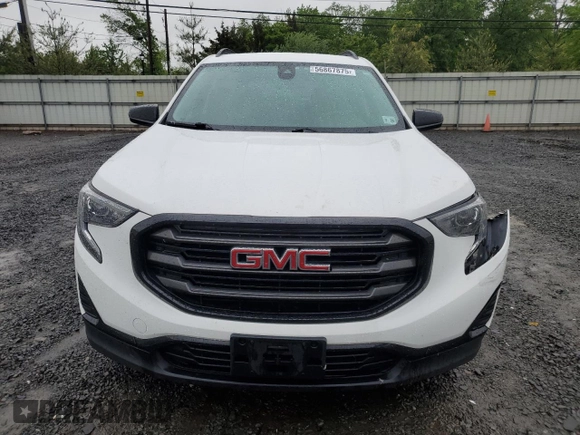 2021 GMC Terrain SLE with VIN 3GKALTEV5ML386042, listed as a Copart auction lot 56867875 with 63,859 mi miles and Salvage title. Bid and sale history available at DreamBid. Image 5.