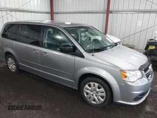 2017 Dodge Grand Caravan SE z VIN 2C4RDGBG5HR784496, wystawiony jako IAAI lot #42286602 z przebiegiem 65 209 mil mil oraz . Historia ofert i sprzedaży dostępna na DreamBid. Obrazek 1.
