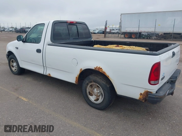 2003 Ford F-150 XL with VIN 1FTRF17273NA15637, listed as a IAAI auction lot 41952924 with 215,704 mi miles and . Bid and sale history available at DreamBid. Image 3.
