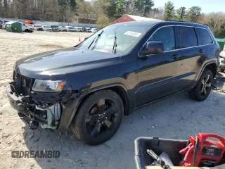 2014 Jeep Grand Cherokee Laredo with VIN 1C4RJFAG9EC527088, listed as a Copart auction lot 52164505 with 147,092 mi miles and Clean Title. Bid and sale history available at carsss.com. Image 1.