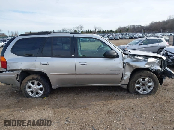 2006 GMC Envoy SLT with VIN 1GKDS13S962109198, listed as a IAAI auction lot 41874502 with 20,785 mi miles. Bid and sale history available at carsss.com. Image 12.