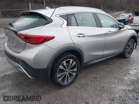 2018 Infiniti QX30 Luxury with VIN SJKCH5CR9JA058968, listed as a IAAI auction lot 41064768 with 64,687 mi miles and . Bid and sale history available at DreamBid. Image 4.