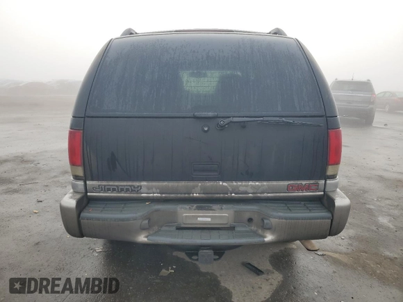 1998 GMC Jimmy SL with VIN 1GKCS13W8W2572514, listed as a Copart auction lot 83016224 with 85,044 mi miles and Salvage Title. Bid and sale history available at carsss.com. Image 6.