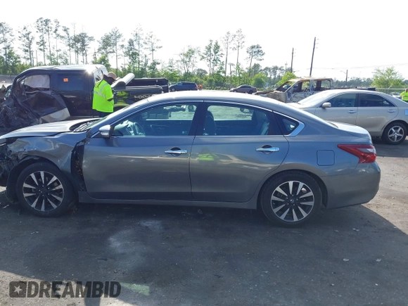 2018 Nissan Altima 2.5 SR with VIN 1N4AL3AP3JC127999, listed as a IAAI auction lot 42016201 with 120,628 mi miles. Bid and sale history available at carsss.com. Image 14.