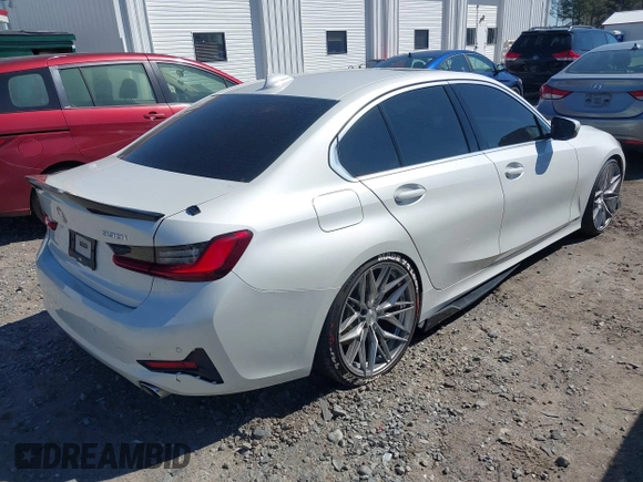 2019 BMW 3 Series 330i with VIN WBA5R1C5XKAJ99366, listed as a IAAI auction lot 41880445 with 48,052 mi miles and . Bid and sale history available at DreamBid. Image 4.