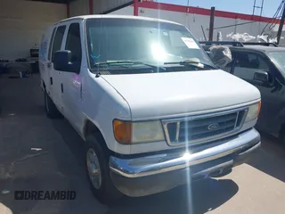 2006 Ford Econoline Cargo with VIN 1FTSE34L76DB20959, listed as a IAAI auction lot 41791345 with 412,774 mi miles. Bid and sale history available at carsss.com. Image 1.