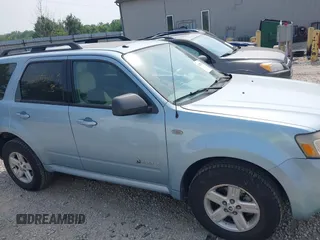2008 Mercury Mariner z VIN 4M2CU29H08KJ33826, wystawiony jako IAAI lot #42205203 z przebiegiem 155 000 mil mil oraz . Historia ofert i sprzedaży dostępna na DreamBid. Obrazek 13.