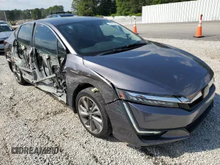2018 Honda Clarity Plug-In Hybrid Touring with VIN JHMZC5F38JC002249, listed as a Copart auction lot 55016234 with 104,432 mi miles. Bid and sale history available at carsss.com. Image 4.