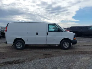 2014 Chevrolet Express Cargo Van with VIN 1GCWGFCA2E1148147, listed as a IAAI auction lot 41101132 with 110,648 mi miles. Bid and sale history available at carsss.com. Image 12.