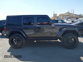 2021 Jeep Wrangler Unlimited Willys с VIN 1C4HJXDG7MW576798, выставлен на аукционе IAAI как лот 42471651 с пробегом 58 481 миль миль и . История ставок и продаж доступна на DreamBid. Изображение 13.