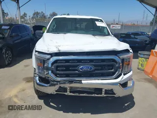 2022 Ford F-150 XL z VIN 1FTFW1ED7NFB06461, wystawiony jako IAAI lot #42878999 z przebiegiem 41 087 mil mil oraz . Historia ofert i sprzedaży dostępna na DreamBid. Obrazek 12.