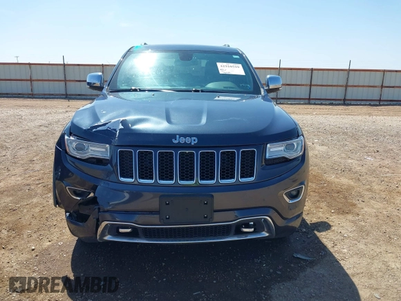 2015 Jeep Grand Cherokee Overland with VIN 1C4RJECG3FC635327, listed as a IAAI auction lot 41910559 with 118,519 mi miles and . Bid and sale history available at DreamBid. Image 12.