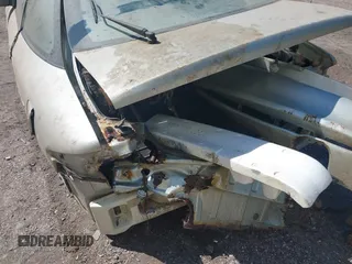 1994 Ford Probe с VIN 1ZVLT22B4R5184936, выставлен на аукционе IAAI как лот 42342496 с пробегом Не указан миль и . История ставок и продаж доступна на DreamBid. Изображение 6.