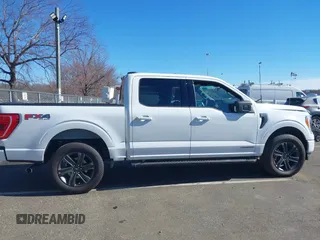 2023 Ford F-150 XL with VIN 1FTFW1ED0PFA18306, listed as a IAAI auction lot 41690965 with 49,988 mi miles. Bid and sale history available at carsss.com. Image 13.
