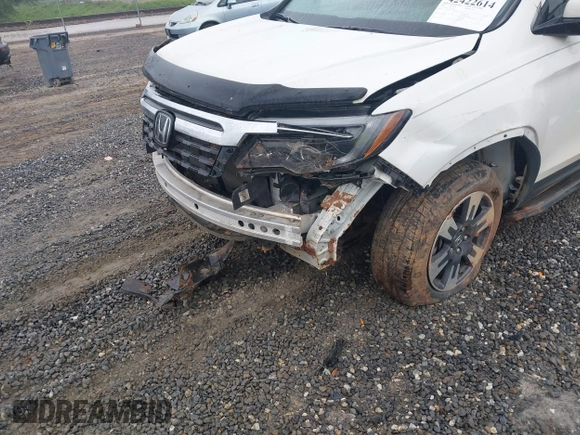 2018 Honda Ridgeline RTL-E with VIN 5FPYK3F77JB017293, listed as a IAAI auction lot 42422614 with 87,700 mi miles and . Bid and sale history available at DreamBid. Image 6.