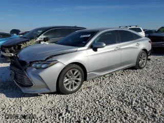 2022 Toyota Avalon XLE with VIN 4T1JZ1FB4NU077717, listed as a Copart auction lot 82772264 with 47,926 mi miles and Salvage Title. Bid and sale history available at carsss.com. Image 1.
