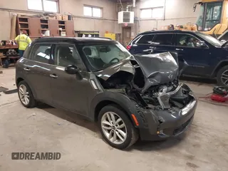 2012 MINI Countryman S with VIN WMWZC3C59CWL83491, listed as a IAAI auction lot 41791573 with 115,355 mi miles and . Bid and sale history available at DreamBid. Image 1.