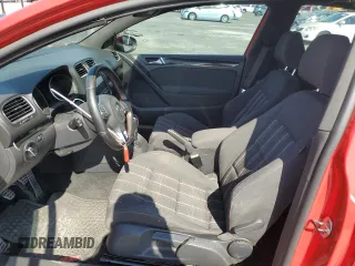 2012 Volkswagen GTI w/Conv & Sunroof z VIN WVWEV7AJ8CW148101, wystawiony jako Copart lot #74610214 z przebiegiem 154 813 mil mil oraz Szkoda całkowita • Salvage title. Historia ofert i sprzedaży dostępna na DreamBid. Obrazek 7.