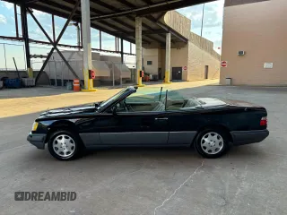 1995 Mercedes-Benz E 320 with VIN WDBEA66E8SC239370, listed as a Copart auction lot 55871605 with 119,102 mi miles and Salvage Title. Bid and sale history available at DreamBid. Image 12.