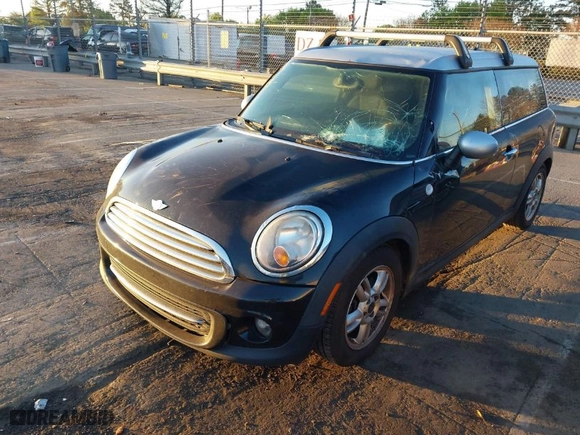 2012 MINI Cooper Clubman with VIN WMWZF3C5XCT189559, listed as a IAAI auction lot 41866550 with 154,721 mi miles. Bid and sale history available at carsss.com. Image 2.