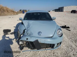 2013 Volkswagen Beetle 2.5L с VIN 3VWJX7AT6DM602838, выставлен на аукционе Copart как лот 82165624 с пробегом 101 188 миль миль и Списание • Salvage title. История ставок и продаж доступна на DreamBid. Изображение 5.