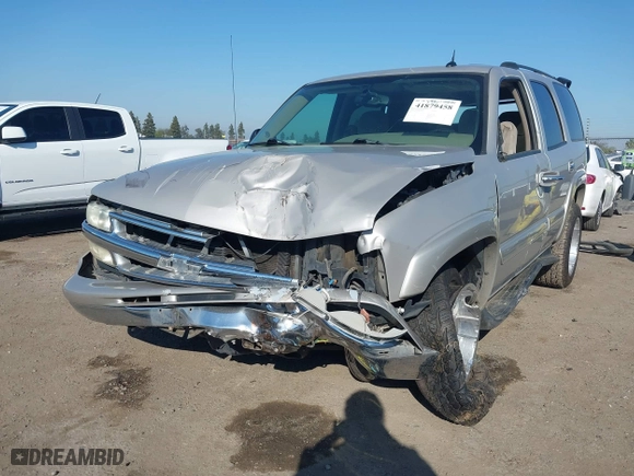 2004 Chevrolet Tahoe LS with VIN 1GNEC13T64J282970, listed as a IAAI auction lot 41879458 with 205,952 mi miles. Bid and sale history available at carsss.com. Image 2.