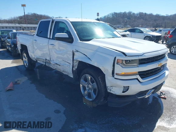2018 Chevrolet Silverado 1500 LT with VIN 3GCUKREC3JG634354, listed as a IAAI auction lot 41734436 with 135,846 mi miles. Bid and sale history available at carsss.com. Image 1.