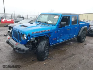 2022 Jeep Gladiator Mojave with VIN 1C6JJTEG1NL128530, listed as a IAAI auction lot 41111344 with 56,119 mi miles. Bid and sale history available at carsss.com. Image 2.
