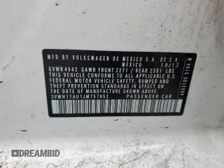 2018 Volkswagen Golf S z VIN 3VWH17AU1JM757852, wystawiony jako Copart lot #84417814 z przebiegiem Nie podano mil oraz Szkoda całkowita • Salvage title. Historia ofert i sprzedaży dostępna na DreamBid. Obrazek 13.
