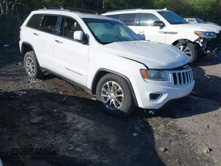2014 Jeep Grand Cherokee Limited with VIN 1C4RJFBG9EC545945, listed as a IAAI auction lot 41988777 with Not provided miles and . Bid and sale history available at DreamBid. Image 1.