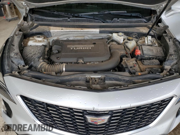2019 Cadillac XT4 FWD Premium Luxury with VIN 1GYFZCR46KF198424, listed as a Copart auction lot 55465185 with 84,706 mi miles and Salvage title. Bid and sale history available at DreamBid. Image 12.