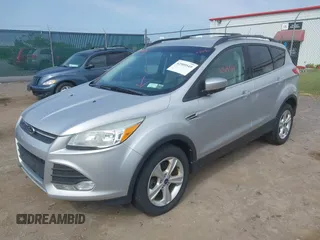 2014 Ford Escape SE z VIN 1FMCU9GX3EUB83978, wystawiony jako IAAI lot #42509549 z przebiegiem 121 388 mil mil oraz . Historia ofert i sprzedaży dostępna na DreamBid. Obrazek 2.