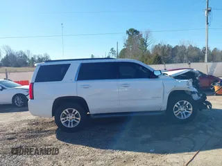 2015 Chevrolet Tahoe LT with VIN 1GNSCBKC0FR104096, listed as a IAAI auction lot 41679298 with 231,005 mi miles and . Bid and sale history available at DreamBid. Image 13.
