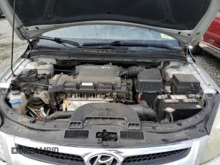 2009 Hyundai Elantra Touring z VIN KMHDC86E29U038194, wystawiony jako Copart lot #57483375 z przebiegiem 218 337 mil mil oraz Szkoda całkowita • Salvage title. Historia ofert i sprzedaży dostępna na DreamBid. Obrazek 11.