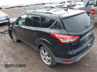 2016 Ford Escape Titanium with VIN 1FMCU9J91GUA59639, listed as a IAAI auction lot 41058369 with 138,046 mi miles. Bid and sale history available at carsss.com. Image 3.