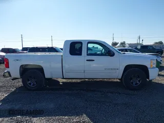 2009 Chevrolet Silverado 1500 LT with VIN 1GCEK29059Z129875, listed as a IAAI auction lot 41678620 with 155,798 mi miles and . Bid and sale history available at DreamBid. Image 13.